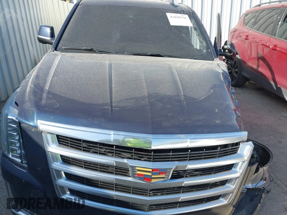 2019 Cadillac Escalade Luxury z VIN 1GYS4BKJ4KR291044, wystawiony jako IAAI lot #41818756 z przebiegiem Nie podano mil oraz . Historia ofert i sprzedaży dostępna na DreamBid. Obrazek 12.