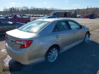 2014 Toyota Camry Hybrid LE with VIN 4T1BD1FK0EU112479, listed as a IAAI auction lot 41901348 with 91,440 mi miles. Bid and sale history available at carsss.com. Image 4.