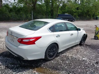 2017 Nissan Altima SV with VIN 1N4AL3APXHC233988, listed as a IAAI auction lot 42123873 with 49,000 mi miles and . Bid and sale history available at DreamBid. Image 4.