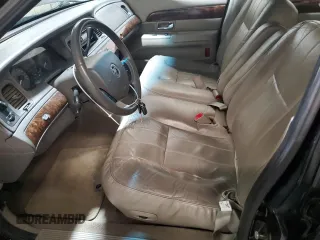 2010 Mercury Grand Marquis LS z VIN 2MEBM7FV6AX628705, wystawiony jako Copart lot #52185105 z przebiegiem 139 485 mil mil oraz Szkody całkowita. Historia ofert i sprzedaży dostępna na DreamBid. Obrazek 7.