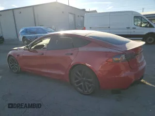 2021 Tesla Model S Plaid z VIN 5YJSA1E65MF435922, wystawiony jako Copart lot #77417854 z przebiegiem Nie podano mil oraz Szkoda całkowita • Salvage title. Historia ofert i sprzedaży dostępna na DreamBid. Obrazek 2.