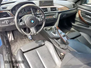 2014 BMW 4 Series 428i with VIN WBA3N3C55EK230214, listed as a Copart auction lot 56896865 with 77,024 mi miles and Salvage title. Bid and sale history available at DreamBid. Image 8.