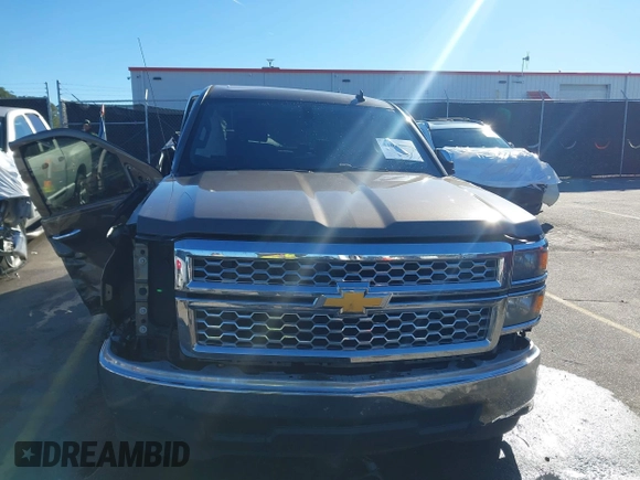 2014 Chevrolet Silverado 1500 LT with VIN 1GCRCREH5EZ165367, listed as a IAAI auction lot 41076729 with 130,425 mi miles and . Bid and sale history available at DreamBid. Image 12.