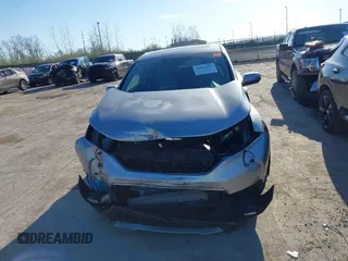 2018 Honda CR-V EX with VIN 7FARW2H56JE097214, listed as a IAAI auction lot 42061999 with 74,862 mi miles and . Bid and sale history available at DreamBid. Image 13.
