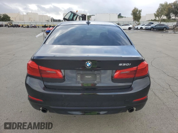 2018 BMW 5 Series 530i with VIN WBAJA5C51JWA38499, listed as a Copart auction lot 49150205 with 59,521 mi miles and Salvage Title. Bid and sale history available at DreamBid. Image 6.