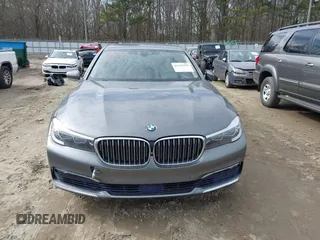 2017 BMW 7 Series 740i with VIN WBA7E2C54HG740170, listed as a IAAI auction lot 41432578 with 110,893 mi miles and . Bid and sale history available at DreamBid. Image 12.