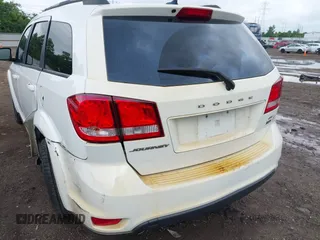 2017 Dodge Journey SXT z VIN 3C4PDCBG4HT531635, wystawiony jako IAAI lot #42460200 z przebiegiem 152 293 mil mil oraz . Historia ofert i sprzedaży dostępna na DreamBid. Obrazek 6.