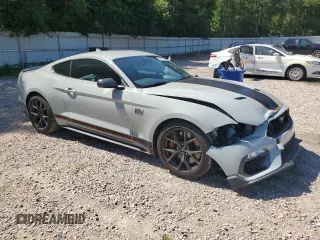 2021 Ford Mustang Mach 1 with VIN 1FA6P8R04M5551165, listed as a Copart auction lot 59977295 with 11,739 mi miles and Salvage title. Bid and sale history available at DreamBid. Image 4.