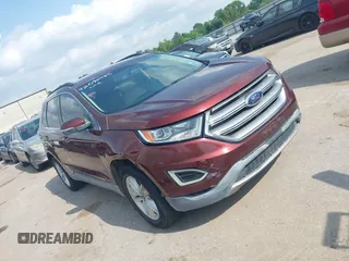 2015 Ford Edge SEL with VIN 2FMPK3J96FBC26148, listed as a IAAI auction lot 42096085 with 164,385 mi miles. Bid and sale history available at carsss.com. Image 1.