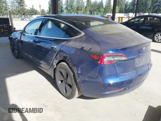 2018 Tesla Model 3 Long Range Battery z VIN 5YJ3E1EA6JF041970, wystawiony jako IAAI lot #42224514 z przebiegiem 79 744 mil mil oraz . Historia ofert i sprzedaży dostępna na DreamBid. Obrazek 3.