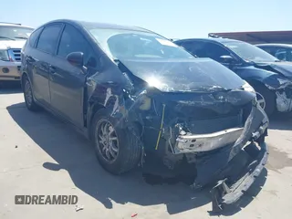 2017 Toyota Prius v Two with VIN JTDZN3EUXHJ063005, listed as a IAAI auction lot 42007228 with 186,507 mi miles. Bid and sale history available at carsss.com. Image 1.