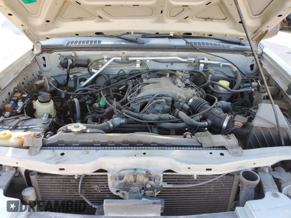 2003 Nissan Frontier SVE with VIN 1N6MD27Y43C432877, listed as a Copart auction lot 80243354 with Not provided miles and Salvage title. Bid and sale history available at DreamBid. Image 12.