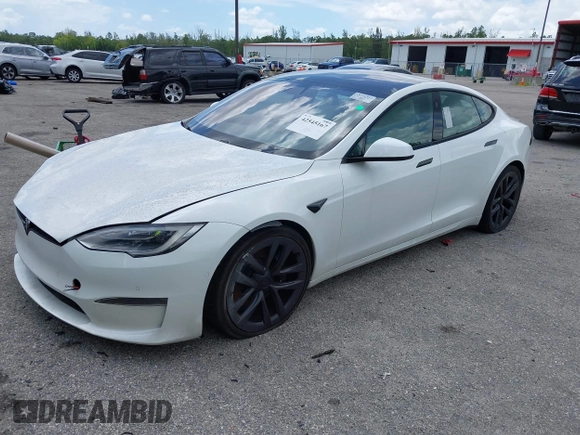 2022 Tesla Model S Plaid with VIN 5YJSA1E61NF460155, listed as a IAAI auction lot 42545167 with 51,711 mi miles and . Bid and sale history available at DreamBid. Image 18.