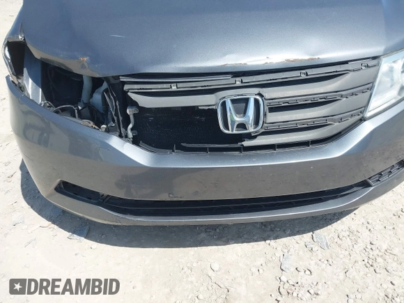 2012 Honda Odyssey EX-L with VIN 5FNRL5H69CB047425, listed as a IAAI auction lot 42064979 with 242,409 mi miles and . Bid and sale history available at carsss.com. Image 6.