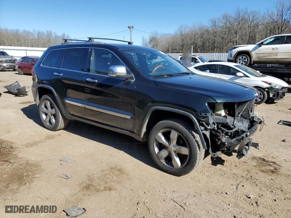 2012 Jeep Grand Cherokee Overland with VIN 1C4RJFCG0CC232021, listed as a Copart auction lot 89358695 with 129,196 mi miles and Salvage Title. Bid and sale history available at carsss.com. Image 4.