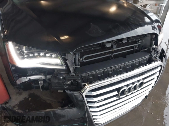 2012 Audi A8 with VIN WAUAVAFD9CN006499, listed as a IAAI auction lot 42461402 with 57,232 mi miles and . Bid and sale history available at DreamBid. Image 6.