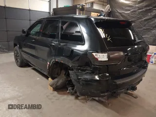 2021 Jeep Grand Cherokee Laredo X with VIN 1C4RJFAG3MC647726, listed as a IAAI auction lot 38421907 with 56,514 mi miles and . Bid and sale history available at DreamBid. Image 3.