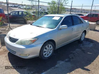 2003 Toyota Camry LE with VIN 4T1BE30K63U769219, listed as a IAAI auction lot 42178777 with 293,769 mi miles and . Bid and sale history available at DreamBid. Image 2.