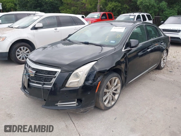 2017 Cadillac XTS Luxury z VIN 2G61M5S32H9158776, wystawiony jako IAAI lot #42528442 z przebiegiem 90 680 mil mil oraz . Historia ofert i sprzedaży dostępna na DreamBid. Obrazek 16.