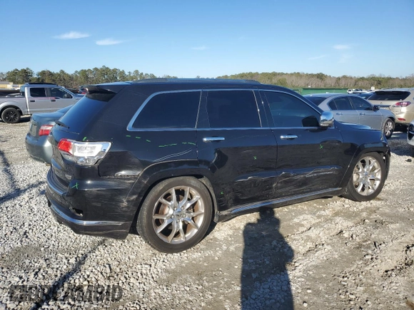 2015 Jeep Grand Cherokee Summit with VIN 1C4RJFJG0FC700014, listed as a Copart auction lot 42981765 with 144,937 mi miles and Salvage Title. Bid and sale history available at DreamBid. Image 3.