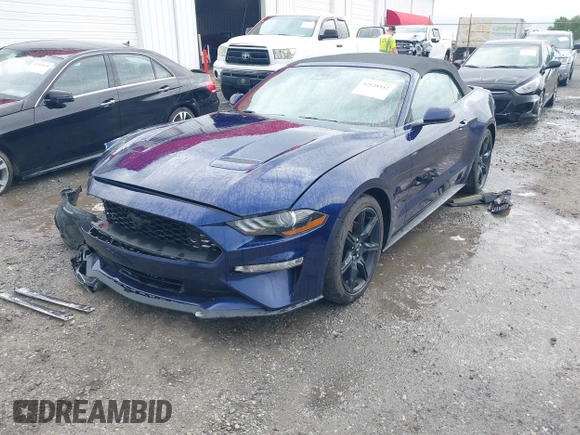 2020 Ford Mustang EcoBoost z VIN 1FATP8UH8L5106720, wystawiony jako IAAI lot #42128952 z przebiegiem 102 234 mil mil oraz . Historia ofert i sprzedaży dostępna na DreamBid. Obrazek 18.