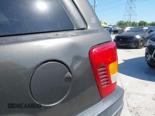2004 Jeep Grand Cherokee Laredo with VIN 1J4GW48S74C401022, listed as a IAAI auction lot 41982319 with 170,607 mi miles. Bid and sale history available at carsss.com. Image 12.