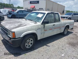 1991 Mazda B-Series Truck z VIN JM2UF3133M0169084, wystawiony jako IAAI lot #42511871 z przebiegiem 175 426 mil mil oraz . Historia ofert i sprzedaży dostępna na DreamBid. Obrazek 2.
