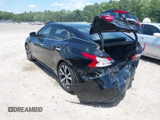 2016 Nissan Maxima Platinum with VIN 1N4AA6AP1GC901425, listed as a IAAI auction lot 42526689 with 118,804 mi miles and . Bid and sale history available at DreamBid. Image 3.