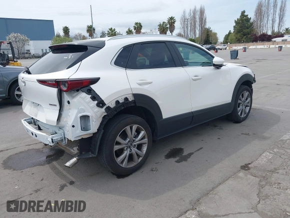 2023 Mazda CX-30 S Carbon Edition with VIN 3MVDMBCM0PM569100, listed as a IAAI auction lot 41978191 with 20,470 mi miles and . Bid and sale history available at DreamBid. Image 4.