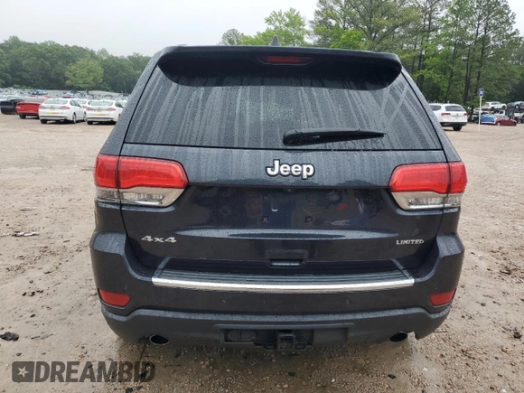 2014 Jeep Grand Cherokee Limited with VIN 1C4RJFBG2EC233725, listed as a Copart auction lot 58524505 with 216,798 mi miles and Salvage title. Bid and sale history available at DreamBid. Image 6.