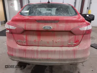 2013 Ford Focus SE z VIN 1FADP3F20DL352710, wystawiony jako IAAI lot #41549408 z przebiegiem 97 460 mil mil oraz . Historia ofert i sprzedaży dostępna na DreamBid. Obrazek 17.