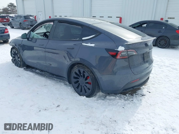 2023 Tesla Model Y Performance with VIN 7SAYGDEF0PF898181, listed as a IAAI auction lot 41577666 with 19,051 mi miles and . Bid and sale history available at DreamBid. Image 3.