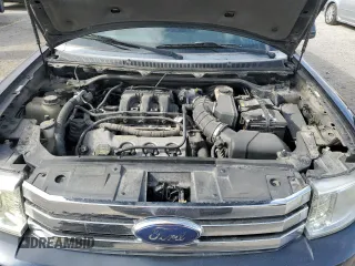 2010 Ford Flex SEL z VIN 2FMGK5CC6ABA24939, wystawiony jako Copart lot #51869795 z przebiegiem 174 987 mil mil oraz Szkoda całkowita • Salvage title. Historia ofert i sprzedaży dostępna na DreamBid. Obrazek 13.