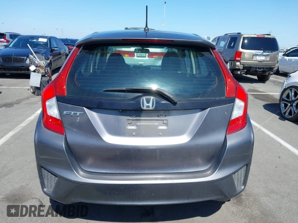 2015 Honda Fit LX with VIN 3HGGK5G54FM731965, listed as a IAAI auction lot 42655355 with 141,205 mi miles and . Bid and sale history available at DreamBid. Image 16.