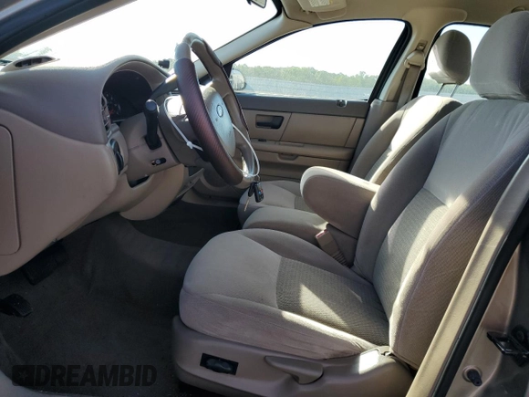 2004 Ford Taurus SE z VIN 1FAFP53284A156633, wystawiony jako Copart lot #58164985 z przebiegiem 91 246 mil mil oraz Szkoda całkowita • Salvage title. Historia ofert i sprzedaży dostępna na DreamBid. Obrazek 7.