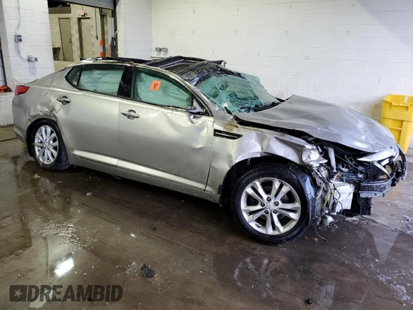2013 Kia Optima EX с VIN 5XXGN4A70DG239393, выставлен на аукционе Copart как лот 41923615 с пробегом Не указан миль и Списание • Salvage title. История ставок и продаж доступна на DreamBid. Изображение 4.