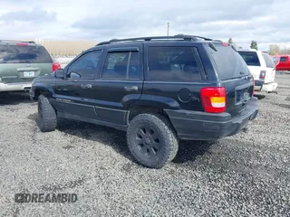 2001 Jeep Grand Cherokee Laredo with VIN 1J4GW48N61C642351, listed as a IAAI auction lot 41783127 with 194,578 mi miles and . Bid and sale history available at DreamBid. Image 3.