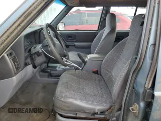 1998 Jeep Cherokee Sport with VIN 1J4FJ68S9WL241184, listed as a Copart auction lot 87360684 with 257,954 mi miles and Clean Title. Bid and sale history available at carsss.com. Image 7.
