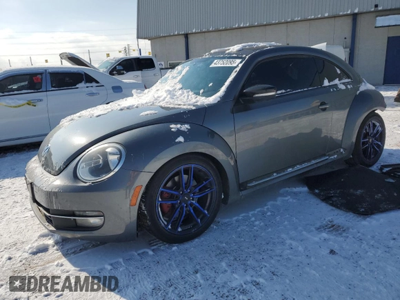 2012 Volkswagen Beetle 2.0T Turbo w/Sun/Snd/Nav PZEV with VIN 3VWVA7AT1CM609293, listed as a Copart auction lot 43752095 with 92,048 mi miles and Salvage Title. Bid and sale history available at carsss.com. Image 1.