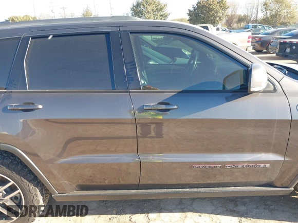 2018 Jeep Grand Cherokee Trailhawk with VIN 1C4RJFLT9JC244212, listed as a IAAI auction lot 41443469 with 77,953 mi miles and . Bid and sale history available at DreamBid. Image 14.