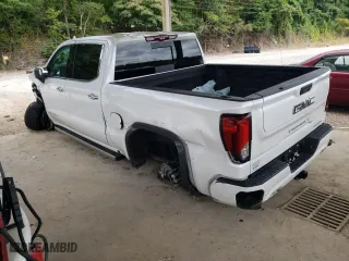 2023 GMC Sierra 1500 Denali Ultimate with VIN 1GTUUHEL0PZ318889, listed as a Copart auction lot 71713984 with 8,986 mi miles and Salvage Title. Bid and sale history available at carsss.com. Image 2.