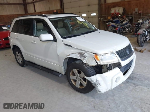 2009 Suzuki Grand Vitara z VIN JS3TD044294100168, wystawiony jako IAAI lot #42489252 z przebiegiem 152 679 mil mil oraz . Historia ofert i sprzedaży dostępna na DreamBid. Obrazek 1.
