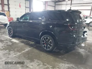 2023 Dodge Durango SRT Hellcat Premium z VIN 1C4SDJH90PC596225, wystawiony jako IAAI lot #41600943 z przebiegiem 18 877 mil mil oraz . Historia ofert i sprzedaży dostępna na DreamBid. Obrazek 3.