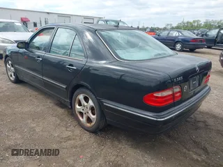 2002 Mercedes-Benz E-Class with VIN WDBJF65J52B496832, listed as a IAAI auction lot 42202331 with 156,304 mi miles. Bid and sale history available at carsss.com. Image 3.