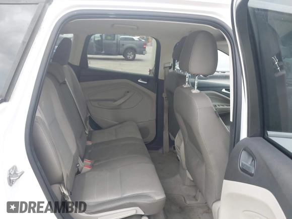 2016 Ford Escape SE z VIN 1FMCU0G79GUC41641, wystawiony jako IAAI lot #42103256 z przebiegiem 153 792 mil mil oraz . Historia ofert i sprzedaży dostępna na DreamBid. Obrazek 8.