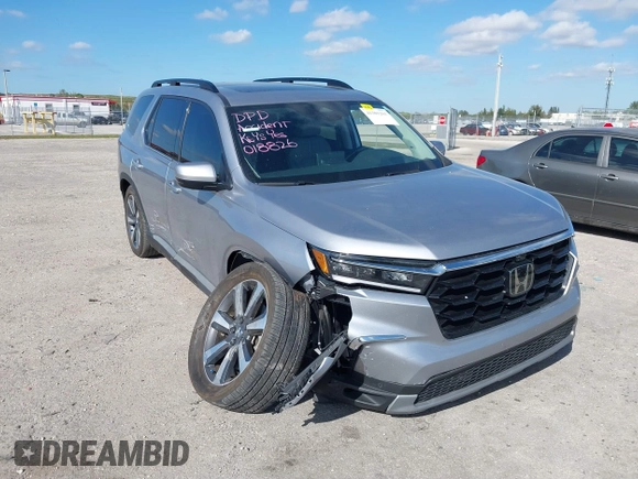 2023 Honda Pilot Elite with VIN 5FNYG1H83PB018826, listed as a IAAI auction lot 41301261 with 23,252 mi miles. Bid and sale history available at carsss.com. Image 6.