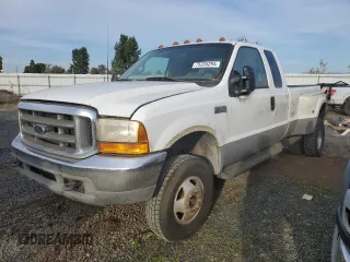 1999 Ford F-350 with VIN 1FTWX33S4XED60955, listed as a Copart auction lot 75335294 with 229,346 mi miles and Clean title. Bid and sale history available at DreamBid. Image 1.