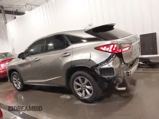 2018 Lexus RX 350 with VIN 2T2BZMCA7JC163886, listed as a IAAI auction lot 42248863 with 57,319 mi miles and . Bid and sale history available at DreamBid. Image 15.