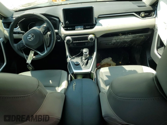 2023 Toyota RAV4 Hybrid XLE Premium z VIN JTMB6RFV2PD105642, wystawiony jako Copart lot #50714615 z przebiegiem Nie podano mil oraz Szkoda całkowita • Salvage title. Historia ofert i sprzedaży dostępna na DreamBid. Obrazek 8.