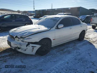2005 Jaguar X-Type z VIN SAJWB52D95XE21462, wystawiony jako Copart lot #89216475 z przebiegiem 114 257 mil mil oraz Szkoda całkowita • Salvage title. Historia ofert i sprzedaży dostępna na DreamBid. Obrazek 1.